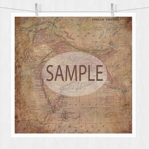 May include: An antique map of the Indian Empire, printed on aged paper with a brown and pink color scheme. The map shows the geographical features of India, including rivers, mountains, and cities. The text "SAMPLE" is superimposed on the map in a brown circle.