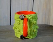 Coffeemug cozy Christms gift.  Mug warmer with nupps. Green cup sleeve. Tea cup cozy, Sailor buttons.