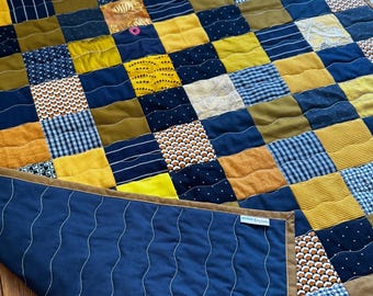 Notre Dame patchwork baby quilt, blue and gold baby blanket