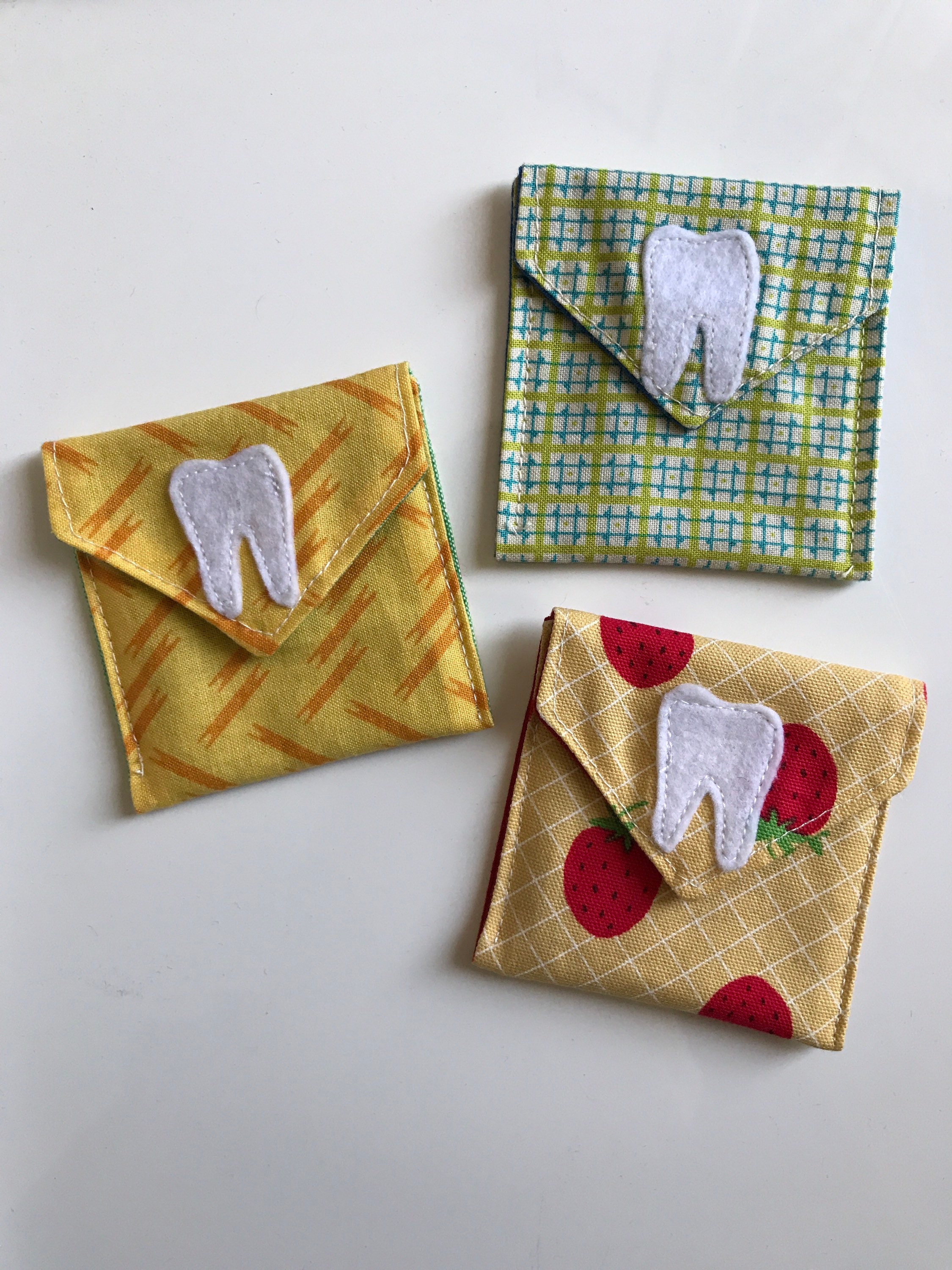 Tooth fairy envelopes made from fabric remnants or upcycled Etsy