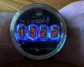 Nixie tube watch wrist IN-17 clock ticker style compact neon-lit wristwatch glowing gas discharge tubes charge jack type C