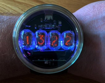 Nixie tube watch wrist IN-17 clock ticker style compact neon-lit wristwatch glowing gas discharge tubes charge jack type C