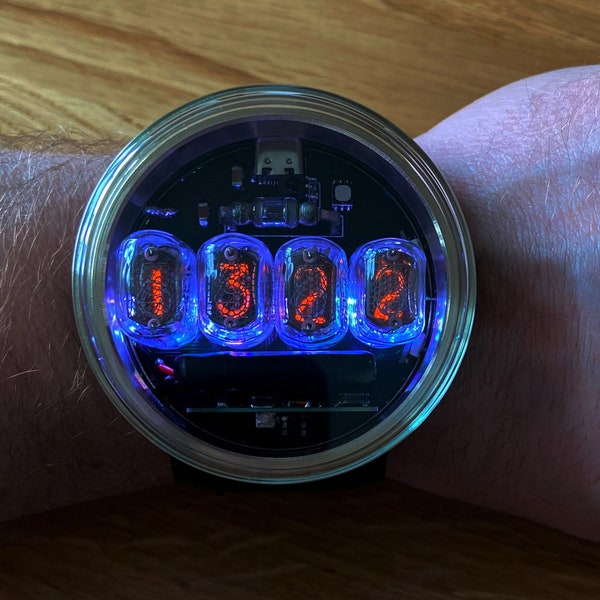 Nixie tube watch wrist IN-17 clock ticker style compact neon-lit wristwatch glowing gas discharge tubes charge jack type C