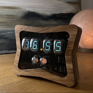 timepiece boasts both VFD and NIXIE tubes iv-22 plus in-2, handcrafted with precision, a marriage of past and present desk clock