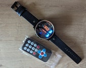 nixie tube watch wrist IV-9 numitron clock ticker style compact neon-lit wristwatch glowing gas discharge tubes