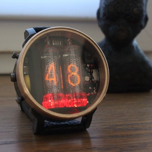 nixie tube watch wrist IN-16 clock ticker style compact neon-lit wristwatch glowing gas discharge tubes with modern ergonomics wearable zdjęcie 7