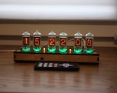 Nixie tube clock with z570M tubes fine 5, not up side down 2 remote control temperature and enclosure plywood and black