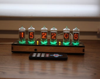 Nixie tube clock with z570M tubes fine 5, not up side down 2 remote control temperature and enclosure plywood and black