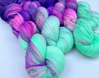 Northern Lights Merino Yarn: Indie Dyed Purple & Mint Green Speckled Yarn