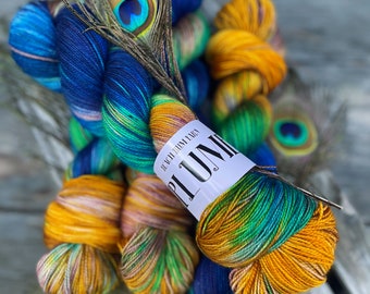 yarn, plume, PRE-ORDER, indie dyed yarn, worsted yarn, DK yarn, sock yarn, peacock feather yarn, wool yarn, blue and gold yarn, sw merino