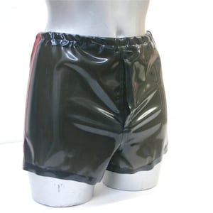 Mens traditionally styled boxer shorts with elasticated waist and fly opening in latex rubber.