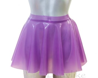May include: A lavender-colored, flared latex skirt. The skirt has a fitted waistband and a full, pleated design. The material appears shiny and smooth, with a slight translucence. The skirt is displayed on a mannequin.