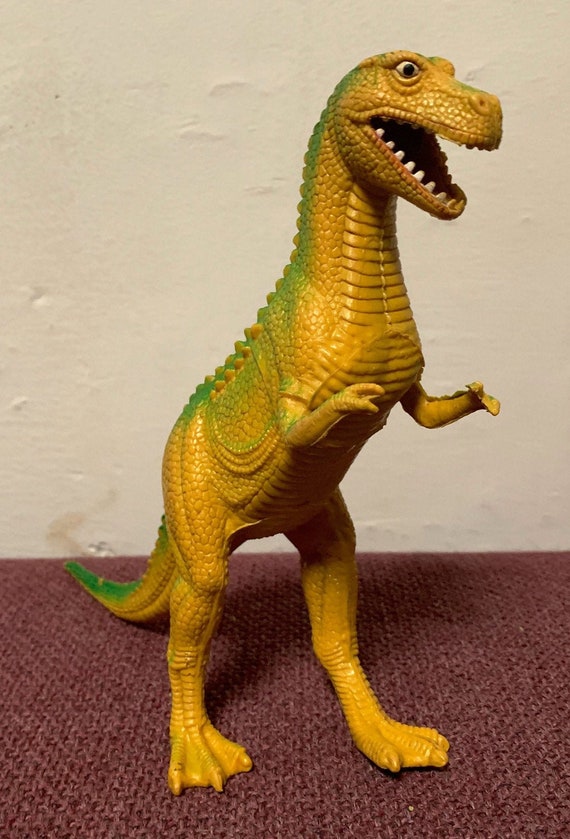 yellow t rex toy