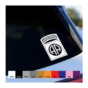 May include: White vinyl decal of the 82nd Airborne Division patch with the words "AIRBORNE" above a circle containing the letters "AA".