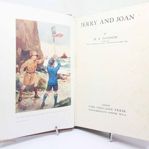 Jerry e Joan 1920s bambini lettura libro avventura Libro illustrato Viaggio Cartonato storia dell'avventura
