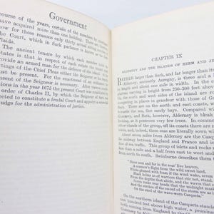 May include: Open book with text on the pages. The left page has the title "Government" and the right page has the title "Chapter IX". The text is in black font on a cream-colored background.