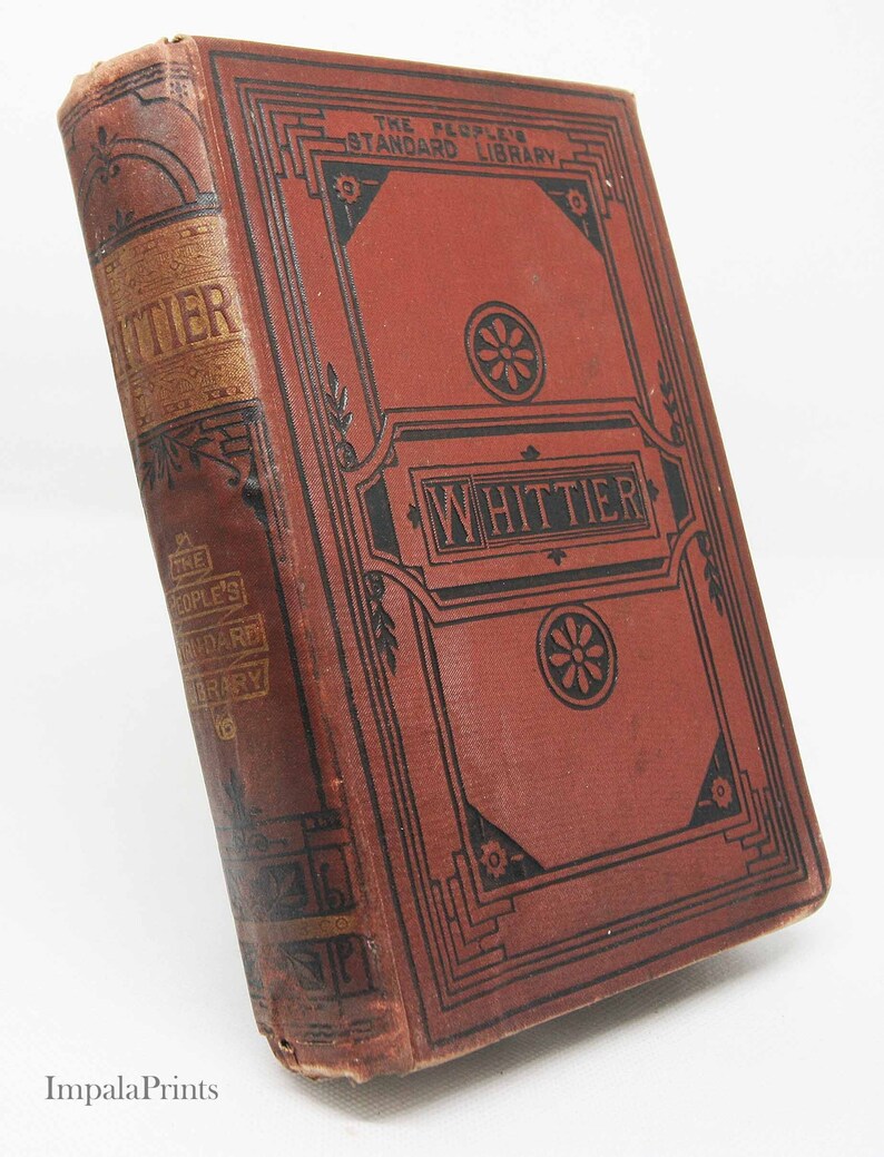 May include: A red book with black and gold accents. The title "Whittier" is printed in gold on the spine and in black on the front cover. The book is part of "The People's Standard Library".