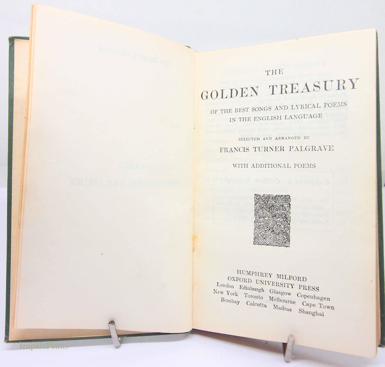 May include: An open book titled "The Golden Treasury" with text in English. The book's pages are cream-coloured, and the cover is green. The title is in large, bold letters, and the text includes the author's name and publisher information.