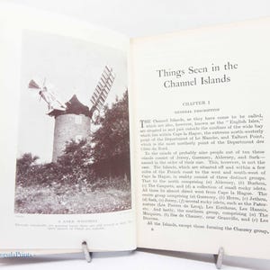 May include: An open book with the title "Things Seen in the Channel Islands" and a black and white photo of a windmill. The text below the photo reads "A Sark Windmill". The book is open to Chapter 1.