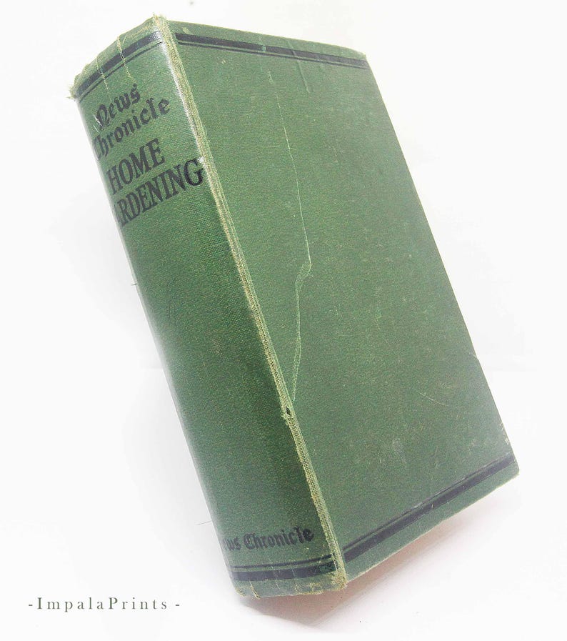 May include: A vintage green hardcover book titled "News Chronicle Home Gardening." The book has black text and a black border on the cover. The book is slightly worn, suggesting age and use.