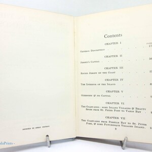 May include: Open book with the contents page visible. The page is cream-colored with black text. The title "Contents" is at the top, followed by chapter titles and page numbers. The text "PRINTED IN GREAT BRITAIN" is at the bottom.