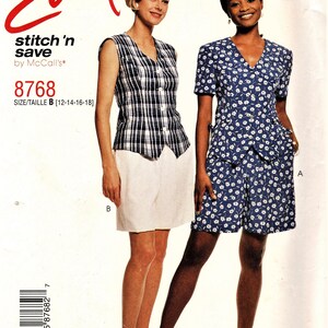 May include: A sewing pattern for two tops, one with a plaid pattern and the other with a floral pattern. The pattern is called "Easy stitch 'n save" by McCall's and the number is 8768. The size is 12-14-16-18.