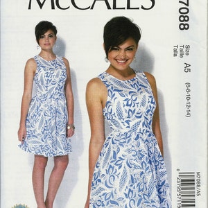 May include: A sewing pattern for a sleeveless dress with a floral print. The pattern is for sizes 6-8-10-12-14. The pattern is from McCall's and the pattern number is M7088.