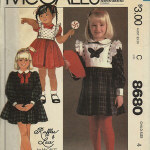 McCall&#39;s  8680   Little Girls Dress with Detachable Bib     Size 4    Uncut