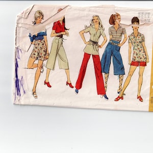 May include: A vintage Simplicity sewing pattern for women's clothing. The pattern number is 9317 and the price is $1.00. The pattern includes four different styles of shorts and tops.
