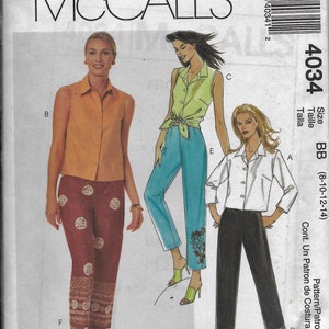 May include: Sewing pattern for a pair of pants with a button-up shirt. The pattern is for sizes 8-10-12-14. The pattern is called McCall's 4034.