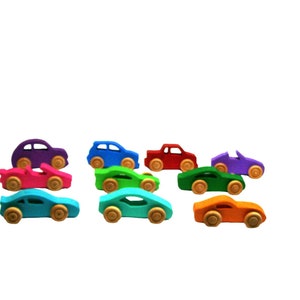 Set of 10 wooden handmade toy cars  they are environment friendly, bright colorful cars. Great gift for kids or kids stocking stuffers.