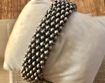 Beautiful woven snake Rick Owens style magnetic Industrial metal pellet Cuff