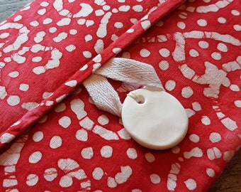 Red and White Batik-Style Fabric Clutch Bag