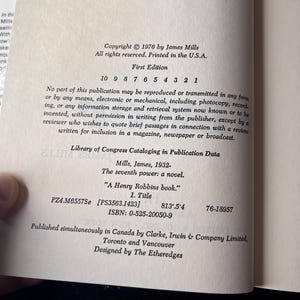 May include: Open book page with text. Copyright 1976 by James Mills. First Edition. Title: "A Henry Robbins book." ISBN: 0-525-20050-9. Library of Congress Cataloging in Publication Data. Published in Canada by Clarke, Irwin & Company Limited.
