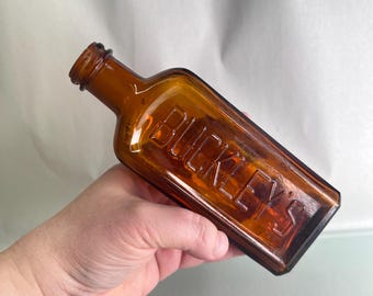 Vintage 1930s Buckley’s Cough Syrup Bottle | Amber Glass | Dominion Canada