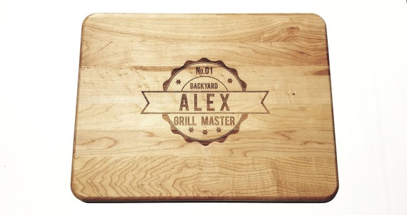 Grill Master with Name Hardwood Cutting Board 12" by 16", Laser cut engraving on wood designed to your needs