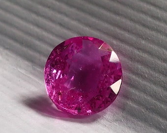 2.16 Ct. Neon Pink Red unheated Madagascar Ruby certified by I.G.I. ( Antwerp ). Top notch color with great tranparency. and sparkle. Video.