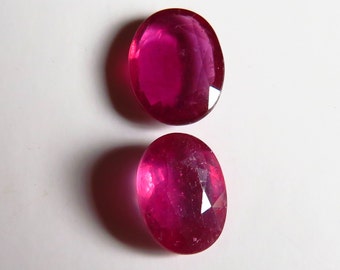 1.60 & 1.55 ct. Natural Ruby pair. Rare find of same size and cut, in vivid red with top clarity and transparency.