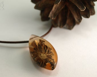 Pinecone – an unique pinecone pendant with a real brown pinecone in orange resin and dark brown leather cord