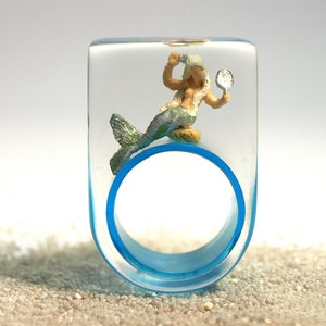 Mermaid ring "Sea breeze" – Fairytale mermaid ring with a little mermaid on light blue ring made of resin
