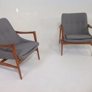 Mid century modern lounge chairs in the style of Ib Kofod-Larsen Lounge Chairs