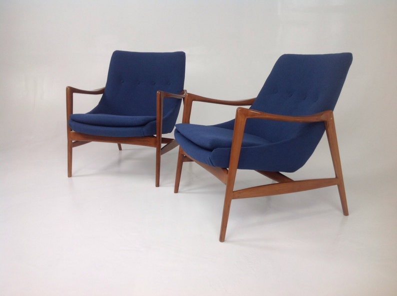 Pair of Mid century modern lounge chairs in the style of Ib Kofod-Larsen Lounge Chairs image 1