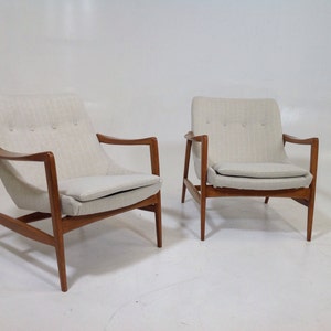 Mid century modern lounge chairs in the style of Ib Kofod-Larsen Lounge Chairs