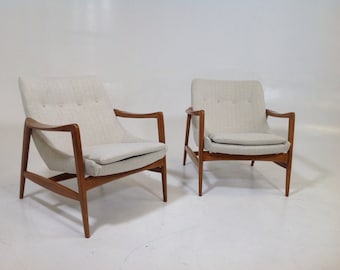 Mid century modern lounge chairs in the style of Ib Kofod-Larsen Lounge Chairs