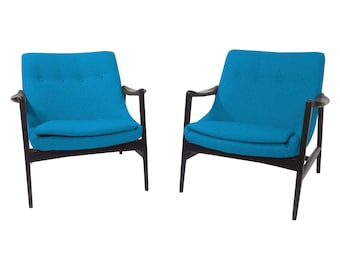 Mid century modern lounge chairs in the style of Ib Kofod-Larsen Lounge Chairs