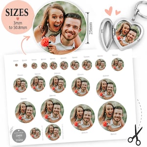 May include: A silver heart-shaped locket keychain featuring a photo of a couple. The image includes a size guide displaying circular photo prints ranging from 3mm to 50.8mm, with labels indicating specific measurements in millimeters.