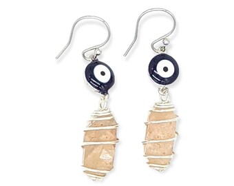 Cosmic Guardian: Pecos Diamonds Quartz Crystal Evil Eye Earrings