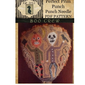 May include: Punch needle pattern for a Halloween-themed cushion featuring two figures, one with a pumpkin head and the other with a skull head. The pattern is titled "Boo Crew" and is from Perfect Prim Punch.
