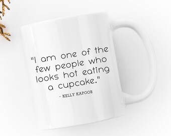Kelly Kapoor Quote - "I am one of the few people who looks hot eating a cupcake." - The Office  - Mindy Kaling-  White 11 fl oz. Coffee Mug