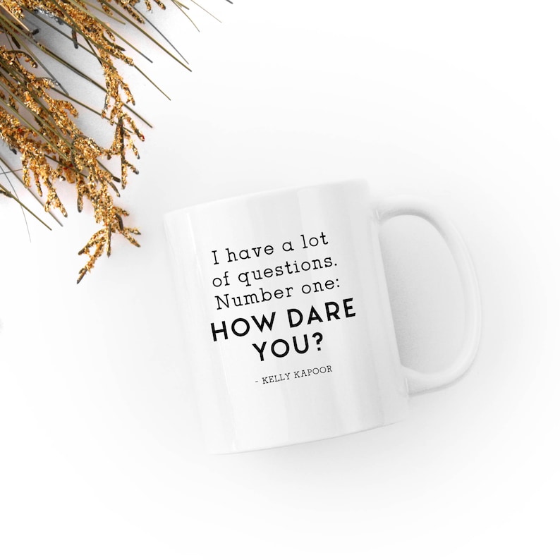 Kelly Kapoor Quote I Have A lot of Questions, Number One How Dare You The Office Show Mindy Kaling White 11 fl oz. Coffee Mug image 1